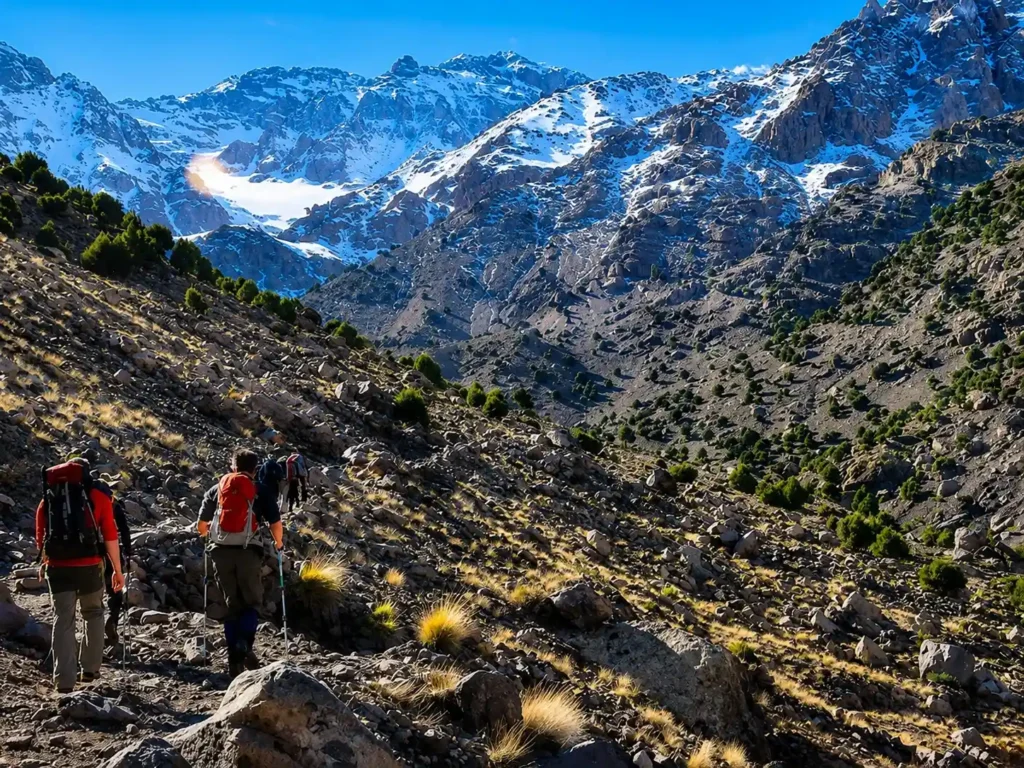 M'Goun trek Morocco — sunrise over Jbel M'Goun (4,068 m) from the Tarkeddit Plateau, High Atlas Mountains
